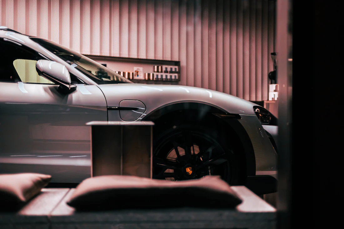 Porsche Taycan Cross Turismo in a showroom