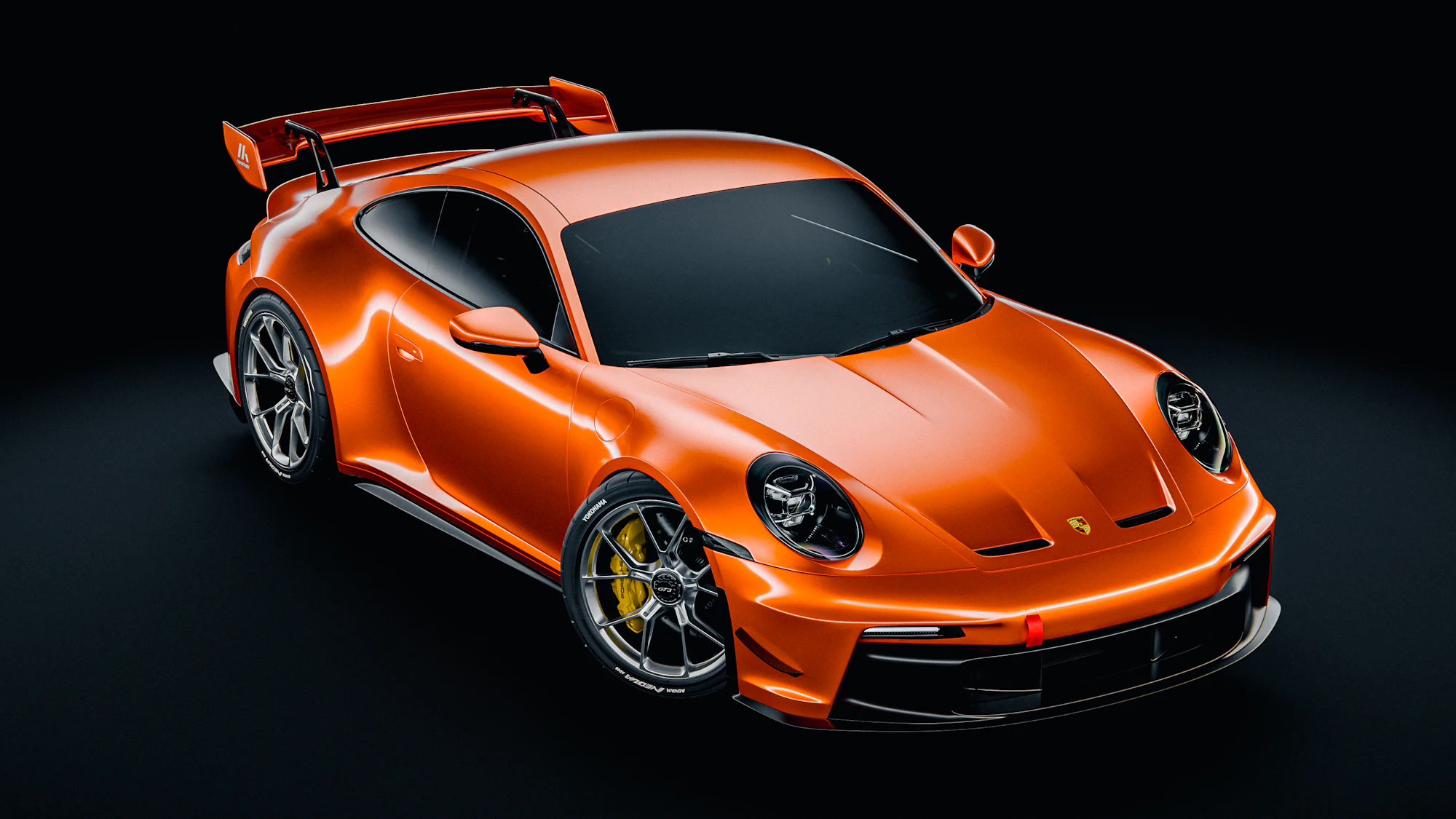 Porsche 911 GT3 seen from above on a dark floor